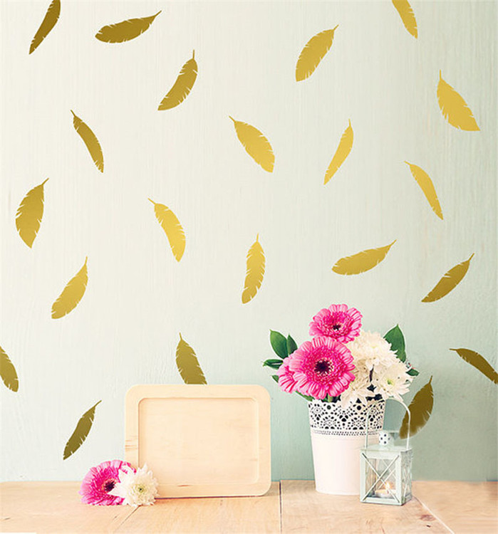 Väggklistermärken guldfjädrar, set om 12 stycken