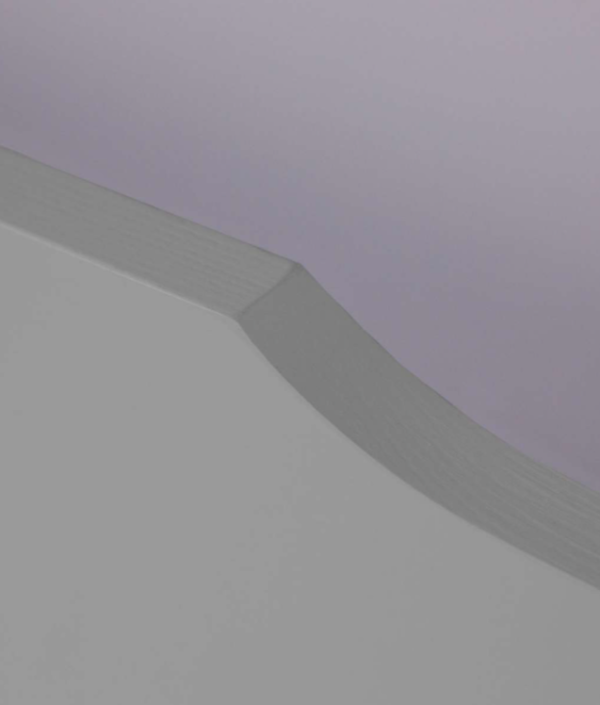 Grå sänglåda på hjul